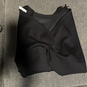 Lululemon long sleeve sweater. Criss cross back that can reverse to front